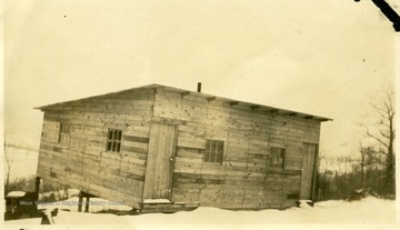 Barracks at Howesville, W. Va. with snow on the ground.