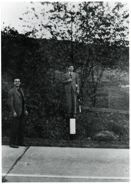 Two men posing for a picture.