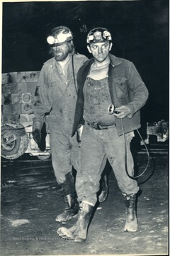 'These unidentified coal miners are shown walking out of the Cannelton No. 8 mine in Fayette County, W. Va., Thursday night. They are among the members of the United Mine Workers who began a nationwide strike at 12:01 a.m. EST Friday. (AP Laserphoto) (jwr6040mbrCNDM/Craig Cunningham) (1981) (See AP wire story PM-UMW Strike, Bjt.)'