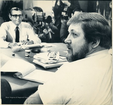 'Sam Church, president of the United Mine Workers, right, sits across the bargaining table from B.R. 'Bobby' Brown, president, Consol. Coal Co. and chief negotiator for the soft coal industry as contract talks resume Monday in Washington. The negotiators are battling a midnight deadline in the search for a tentative contract settlement in hopes of averting a nationwide strike. (AP Laserphoto_ (see AP AAA wire story0 9tim21205stf/daugherty) 1981 slug : Coal Talks.'