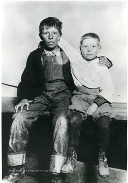 Portrait of two boys with arms around each other.  Ludlow Strike. 