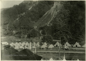 Tents set up at the base of a mountain at Paint Creek, W. Va. 'Pix used on page 34 of [Lee's] book.'