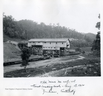 Old Mine No. 207-208 Tipple in Dunham, Kentucky. "First loading coal- Aug. 17, 1912."