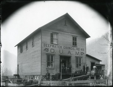 People stand on the porch of the Deepwater Council No. 40 building.