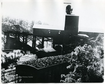 Coal cars going under tipple, Cranberry or Summerlee Mine.