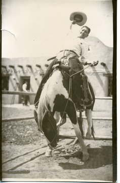 Joe Ozanic riding a pony.