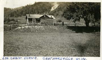 Log cabin scene in Chathamsville, W. Va. Photograph from Joe Ozanic scrapbook.