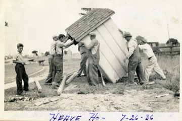 'Heave Ho!' Volunteer workers at Miners Cemetery, Mt. Olive, Ill.'