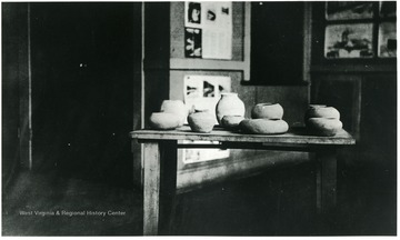 Pottery on display on a table.