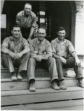 Group portrait of men at Arthurdale. 'Jennings Barnes, top, T. G. Tichener, Andrew Goldstrum Sr, and Russell Whipkey.'