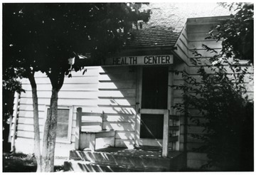 The community health center entrance from small cement porch.