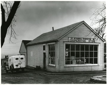 The Arthurdale Association, Inc. Co-operative Store with Mountaineer Sales Co. truck beside it.