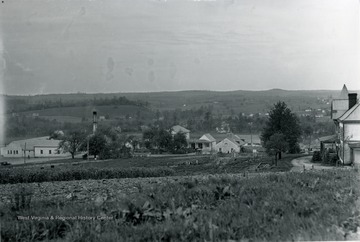 View of Arthurdale from a field.  Community building in center.