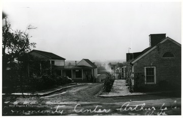 Community Center and other buildigs at Arthurdale.  Craft shop sign visible on the community center.