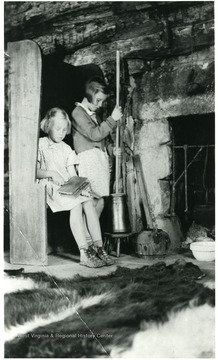 'Elementary pupils in the Fairfax Cabin at Arthurdale, participating in activity on pioneering.'