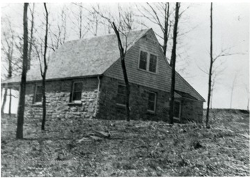 Stone homestead with some trees around it at Arthurdale.