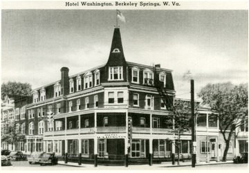 Postcard of the Hotel Washington, Berkeley Springs, W.Va.  'Hotel Washington in Berkeley Springs, Morgan County, W.Va., is fully equipped with elevator service.  Located on the square at the main entrance to the famous Health Mineral Springs.  Washington visited here in 1748.  Lord Fairfax gave the famous springs to the public.  Berkeley Springs was Established as a town in 1776.  Virginia treated her sick soldiers here.  Dr. C.W. Chancellor called it a 'health-giving luxury fit for the Gods.'  Generals Washington, Buchanan, Gates and many others bought lots here.  Berkeley Springs is an historical place.' 