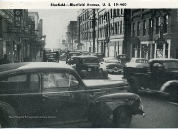 Cars driving in downtown Bluefield on Bluefield Avenue.