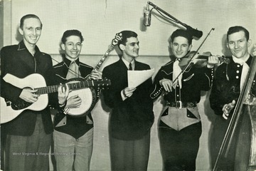 Portrait of The Lonesome Pine Fiddlers of Bluefield, W.Va. Gorden Jenning - M.C. with guitar; 'Lazy' Ned Cline - with banjo; 'Curly' Ray Cline - with fiddle; Ezra Cline - with bass fiddle.  