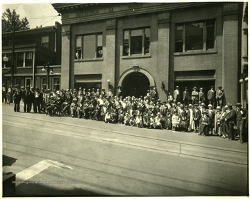 Large crowd of people in front of the Bluefield Daily Telegraph Office.