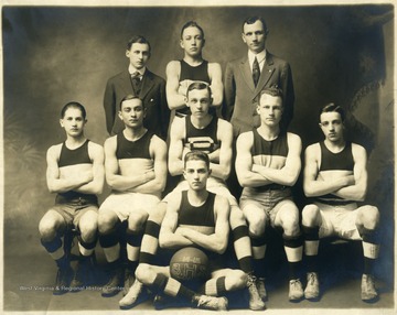 Seven basketball players and two other gentlemen in a group photo of the Bluefield basketball team.