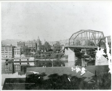 View of Charleston, West Virginia with bridge over river on right.