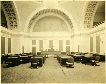 Desks and chairs inside the Capitol building in Charleston, W. Va.