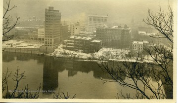 A picture postcard of a winter view of Charleston, West Virginia.