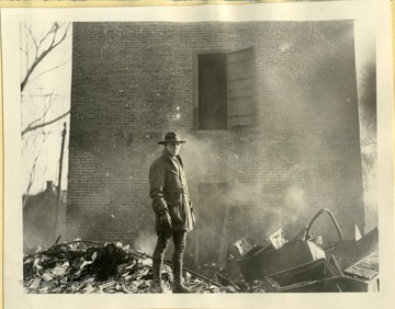 Col. Jackson Arnold looks over the damage to the West Virginia State Capitol Building  fire, in Charleston, West Virginia.