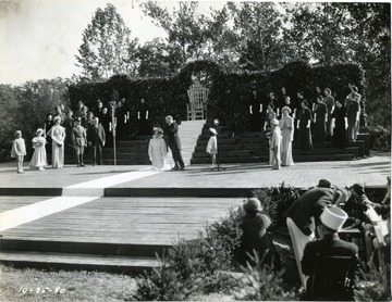 Governor H. G. Kump crowns Queen Sylvia VI, Miss Sarah Kathryn Thompson at the Forest Festival in Elkins, West Virginia.