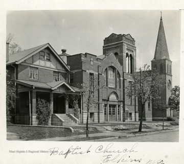 View of the First Baptist Church adjacent to St. Brendan's Church on Randolph Avenue in Elkins, West Virginia.