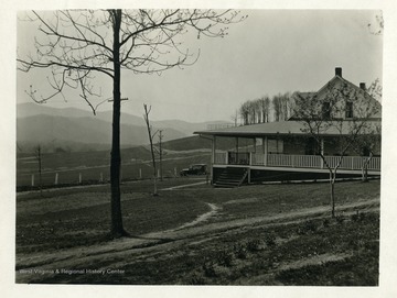 A car is parked in front of the Tygart Valley Country Club House near Elkins, West Virginia.