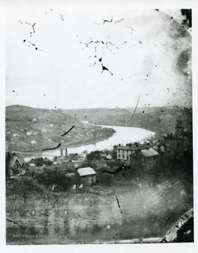 Postcard from the East Side in Fairmont, West Virginia. Houses on the West Side can be seen near the Suspension Bridge and Monongahela River.