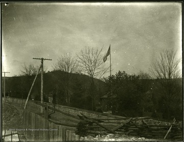 View of National Cemetery including Superintendent's House and a brick wall in Grafton, W. Va.