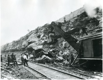 Empire Engineering Co. removes rocks from the railroad.