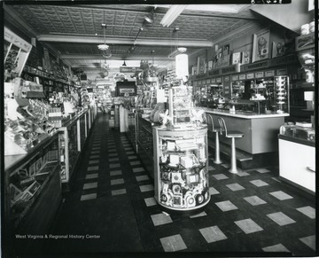 Interior view of Malone's Drug Store with soda fountain on Main Street in Grafton, W.Va.  