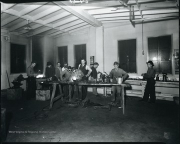 Men are working in a workshop in Grafton, West Virginia.