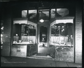 Entrance and window displays of Loar's Jewelry Store in Grafton, W. Va.