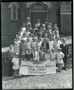 Group portrait of the members of the Junior Christian Endeavor Society of United Brethren Church on Dewey Avenue, West Side, Grafton, West Virginia.