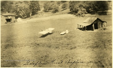 Small airplane on a farm in Grafton, W. Va.