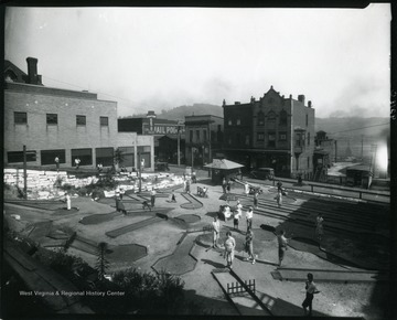 People playing miniature golf at a course on Latrobe Street in Grafton, West Virginia. Later the site of the Pure Oil Gas Station.