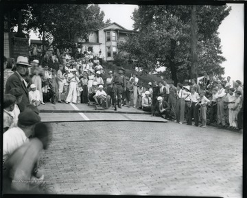 Crowd gathered to watch a go cart race in Grafton, West Virginia.