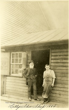 Two men stand in the door of Lilly's Shoe Shop in Grafton, W. Va.