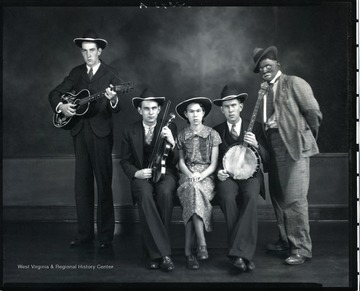 West Virginia Ramblers, a string band, posing with their instruments.