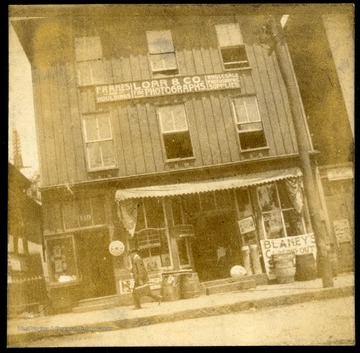 Exterior view of Loar and Co. Photographs in Grafton, W. Va.  Studio on 2nd floor, lived on 3rd floor 1890-1902.