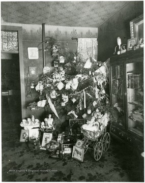 Christmas tree and presents in a home in Grafton, W. Va.