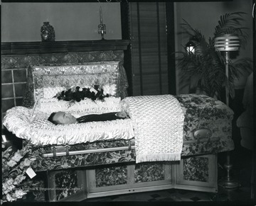 An unidentified man in a coffin at a funeral parlor in Grafton, West Virginia.