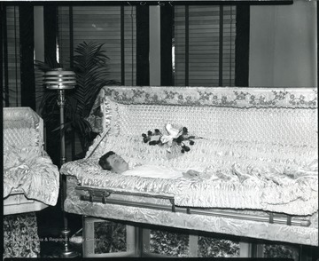 An unidentified woman in a coffin at a funeral parlor in Grafton, West Virginia.