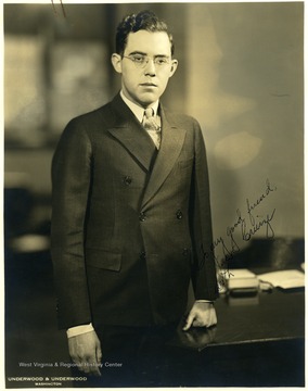 Portrait of Rush D. Holt standing.