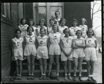 Members of a Girls Basketball team in Grafton, West Virginia, pose for a group portrait.